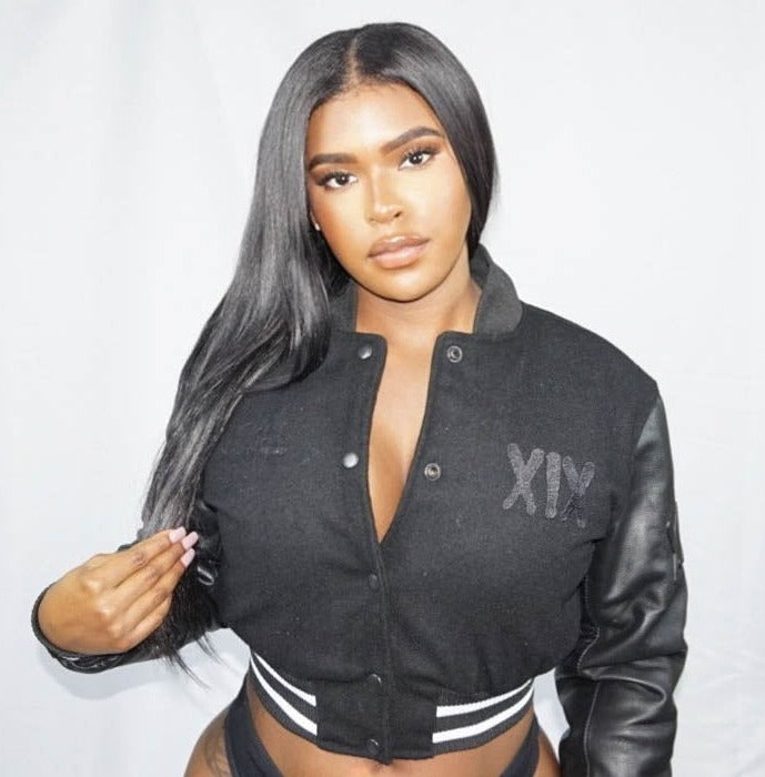 XIX faux leather cropped varsity jacket in black